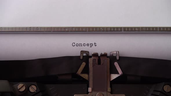 Typing word Concept on retro typewriter. Close up.