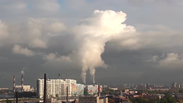 Smoke From Chimneys Forms Clouds