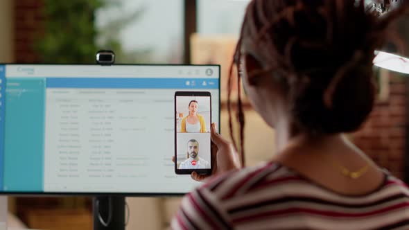 Business Student Attending Videocall Meeting with Colleagues