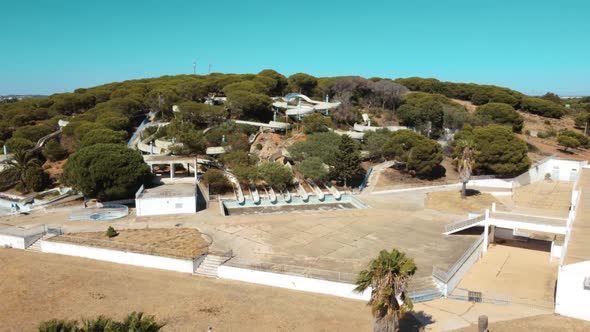 Aerial View Of Abandoned Aqualine Water Park On A Sunny Summer Day In Altura, Algarve, Portugal. - d