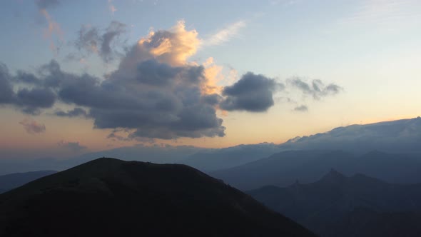 Clouds float over the mountains