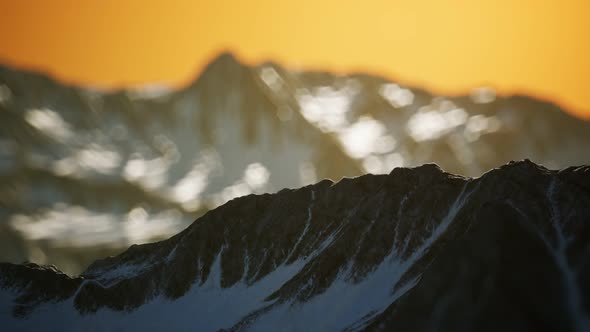 Winter Landscape in Mountains at Sunset