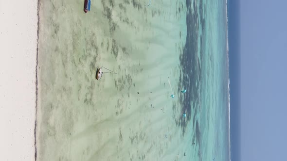 Vertical Video of the Ocean Near the Coast of Zanzibar Tanzania Aerial View