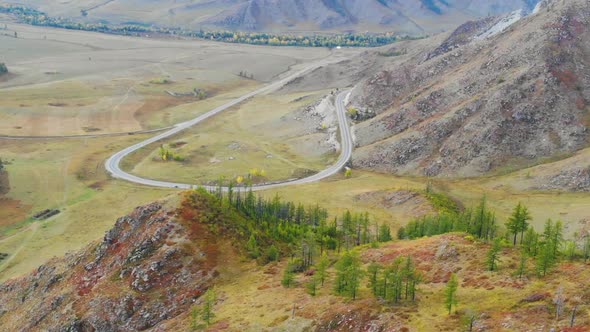 Beautiful Views of the Mountains, Forests and Road of Altai in the Fall on a Sunny Day