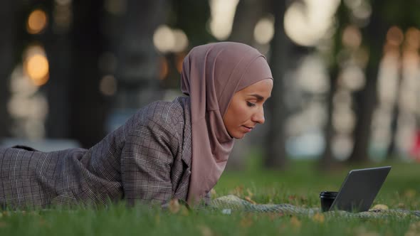 Muslim Focused Islamic Girl Business Woman in Hijab Female Student with Laptop Working Online