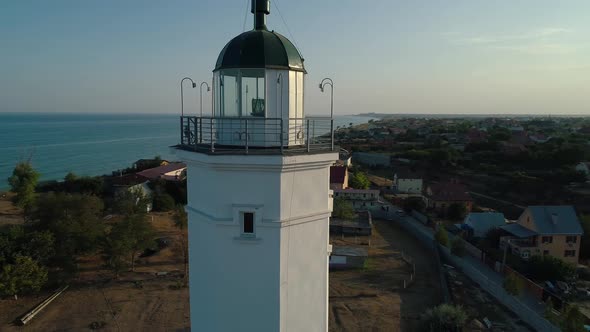 Aerial Drone Footage. Fly Around Rural an Old Rustic and Historic Lighthouse Building. Close Up Shot