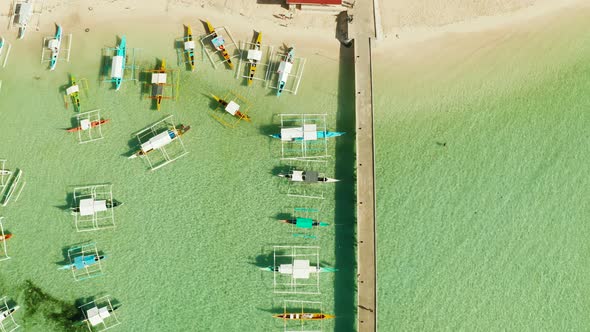 Pier with Boats in the Sea Aerial View