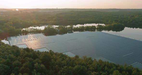 Aerial View of Environmentally Friendly Energy with Floating Solar Panels Platform System on the