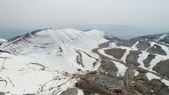 Snowy Mountains And Ski Center Aerial View