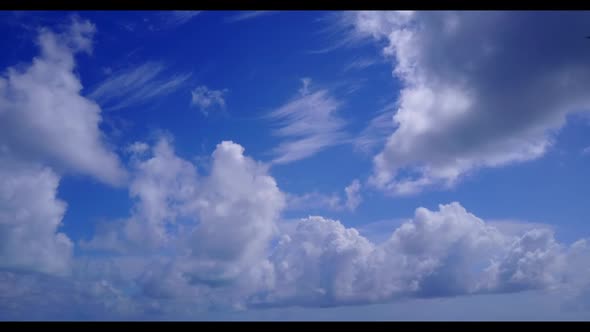 Aerial above travel of perfect shore beach journey by blue sea with white sandy background of a dayo