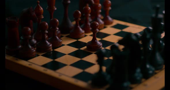 Close Up of Wooden Chess Pieces on Chessboard