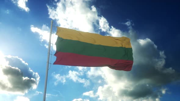 Flag of Lithuania Waving at Wind Against Beautiful Blue Sky