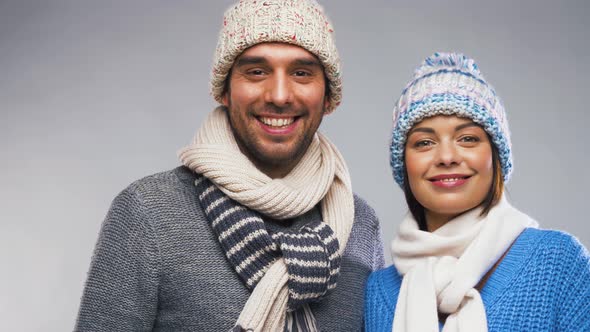 Happy Couple in Winter Wear Looking at Each Other 4