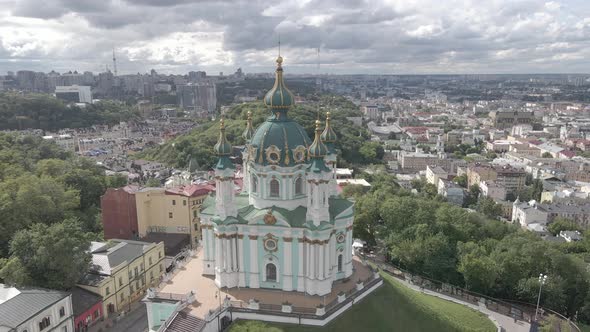 The Architecture of Kyiv. Ukraine. St. Andrew's Church. Aerial. Slow Motion, Gray, Flat