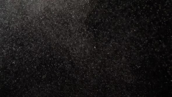 Tiny White Dust Particles On Black Background