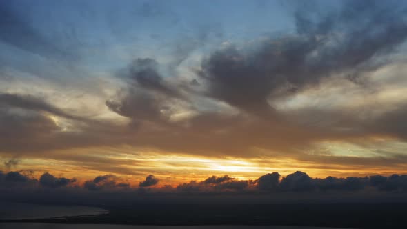 Aerial View of Colorful Sunset Over the Coastal Plane