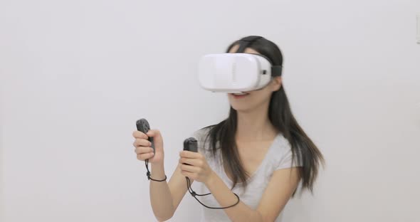 Woman Play Game With VR Device