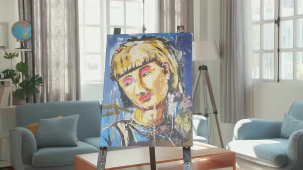 A Canvas Photo Of Portrait Of A Girl Is In The Living Room At Home