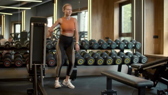 Successful Sport Woman Dancing at Gym. Fit Girl Having Fun in Fitness Center