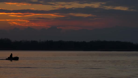 Fishing Boat at Sunset at The River