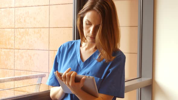 Nurse using digital tablet