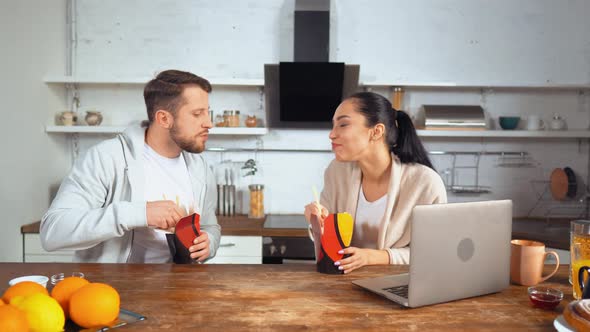 Female and Male Workers Eating Asian Cuisine