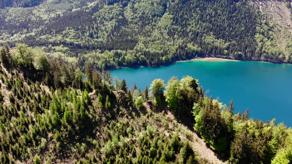 Beautiful view from the Signalkogel to the Lake Langbathsee and Mountains drone video