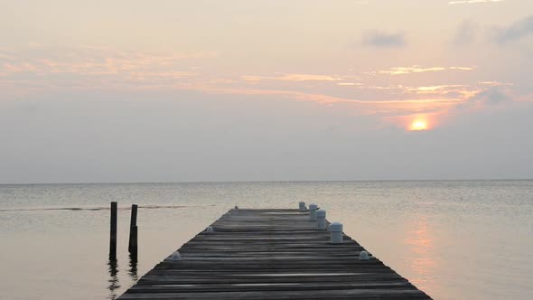 Calm Sunrise Over Jetty alt