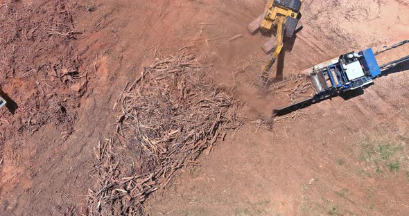 Construction Site Area in Wood Chipper Machine with Mulch an Work