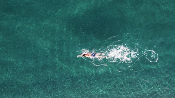 Man Swimming in the Sea