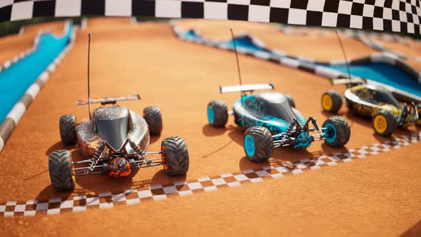 Three colourful RC-cars standing on a start line, ready for a toy race. 4KHD