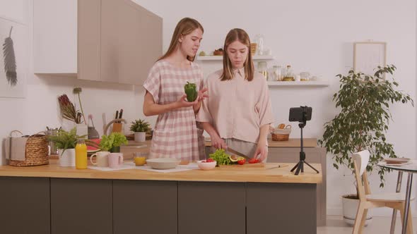 Twin Sisters Recording Cooking Video