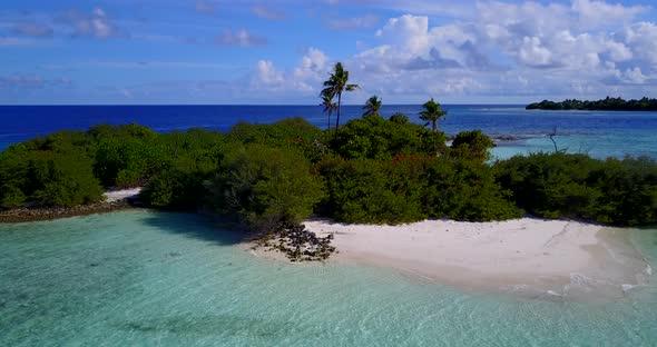 Luxury above abstract view of a summer white paradise sand beach and aqua blue ocean background in c