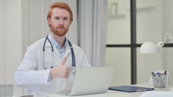 Redhead Male Doctor with Thumbs Up Sign