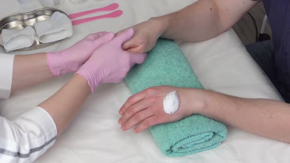 Foam hand massage to soften skin
