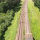 Passenger train on the Rails. Following The Train, Aerial - VideoHive Item for Sale