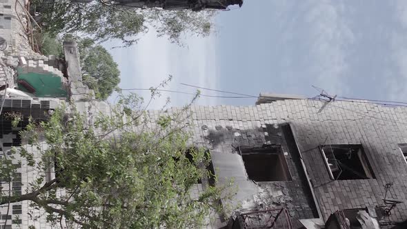 Vertical Video of a Multistorey Building Destroyed During the War in Ukraine