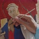 hand of man with painter brush paints on canvas a portrait of a Saint Mary - VideoHive Item for Sale