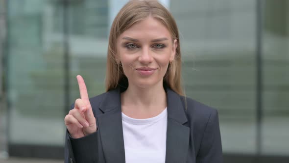 Young Businesswoman Showing No Sign By Finger Shake