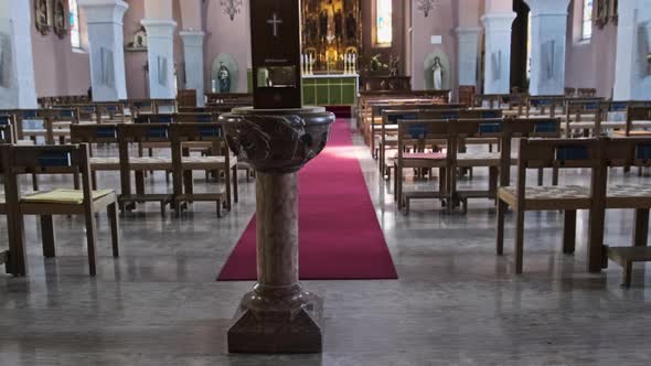 Empty Catholic Cathedral Inside Wooden Benches for Prayers Church Interior