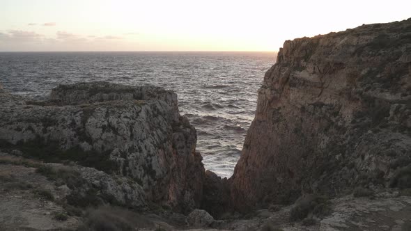 Ravine near Mediterranean Sea Coastline of Malta on Sunny Chilly Winter Evening