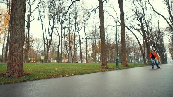 Sporting Bearded European Man in Ornamental Jacket Accelerates From Afar and Makes Technical Turn in