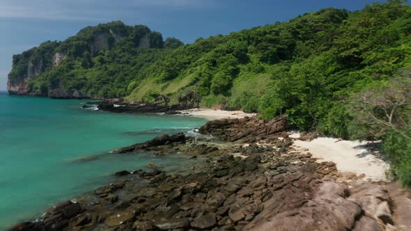 Panoramic Drone Shot of Ocean Waters in Koh Phi Phi Island and Lush Forest Tree