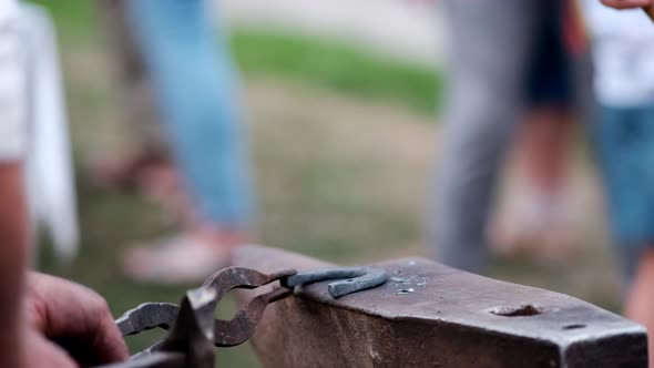 Closeup of Forging a Horseshoe