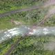 Aerial shot of Nature - Green Trees, River, Road, Bridge, and Railway - VideoHive Item for Sale