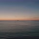Aerial Shot of Scene with Ship Cruising at Open Sea at the Sunset - VideoHive Item for Sale