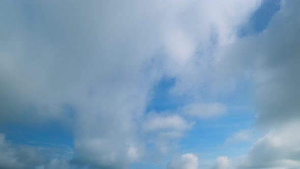 4K UHD : Heavy white clouds moving in the sky