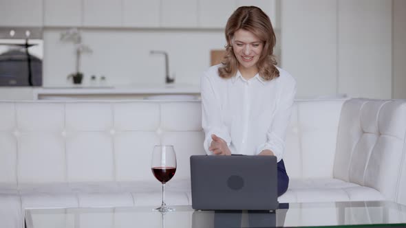 Businesswoman Has Video Call in Flat