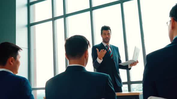 Group of Business People Meeting in a Seminar Conference