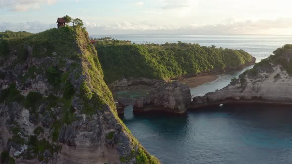 Aerial View of the Green Tropical Coast of the Island of Nusa Penida, Atuh Beach, Bali, Indonesia